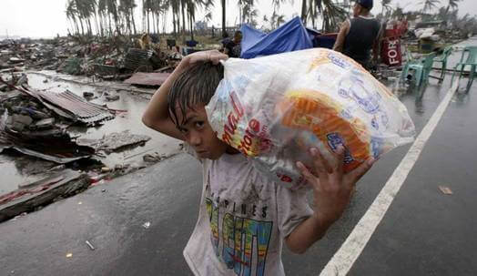 Photo of Typhoon Haiyan: 10,000 feared dead as extent of devastation in the Philippines is revealed and monster storm heads towards Vietnam