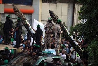 Photo of Imponente parata militare a Gaza, Hamas festeggia il 27° anniversario della fondazione