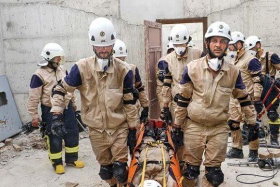 Photo of White Helmets’ Chemical Cargo Transferred to Terrorists’ Warehouse in Idlib