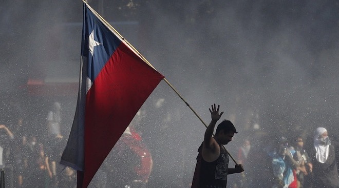 Photo of Cile, una rivolta repressa nel sangue